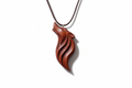 Black Cherry Wolf pendant on a white background