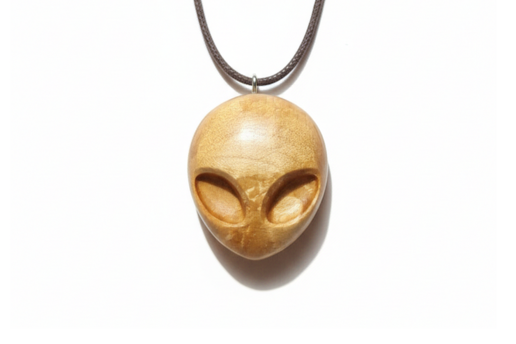 Handcrafted maple wood alien head pendant necklace with brown cord
