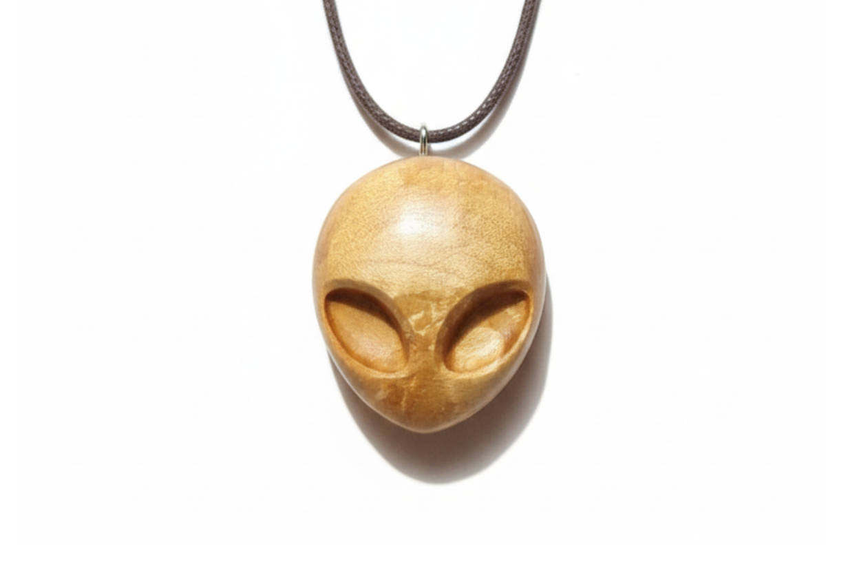 Handcrafted maple wood alien head pendant necklace with brown cord