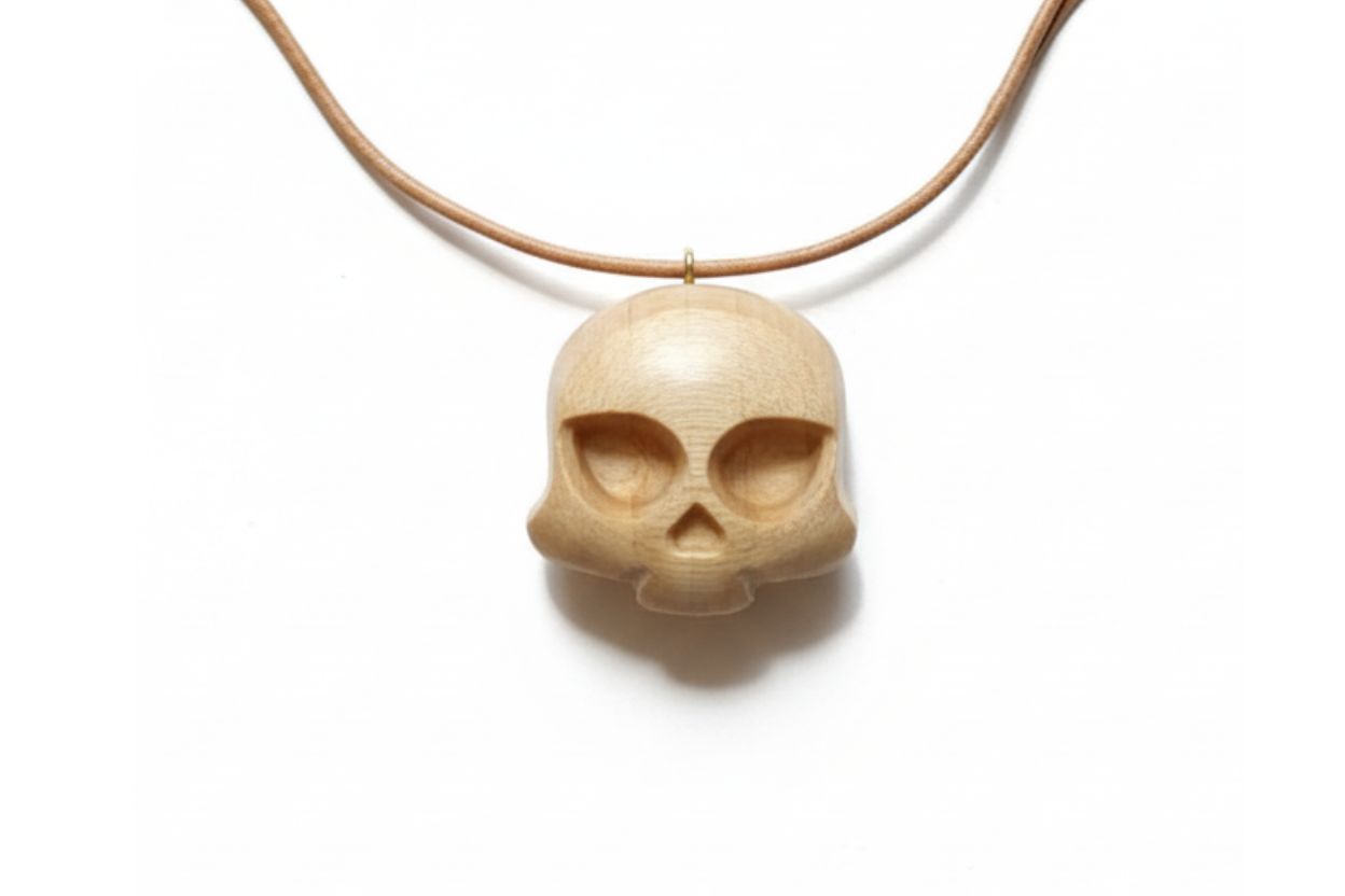 Almond Skull Pendant — Silver Maple Wood